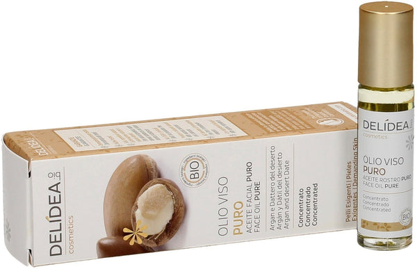 DELIDEA Olio Viso Argan & Dattero Bio 10 ml. Una bottiglia di olio viso naturale su sfondo chiaro, enfatizzando la purezza degli ingredienti rigeneranti e l'impegno per una bellezza autentica e consapevole. Perfetto per la skincare anti-età e nutriente.