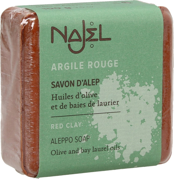 Sapone peeling di Aleppo con argilla rossa Najel per pelle sensibile e secca. Rimuove delicatamente le impurità e dona luminosità.